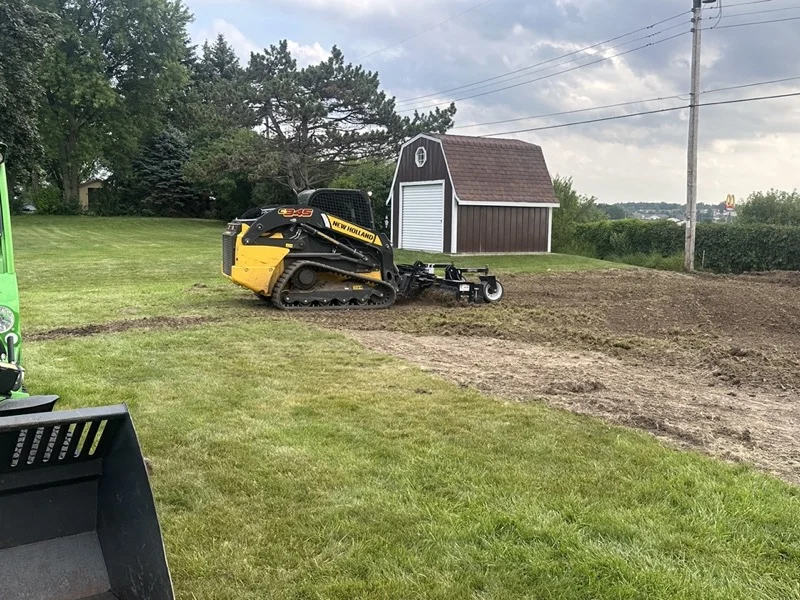 Grading and raking work on a Wisconsin yard
