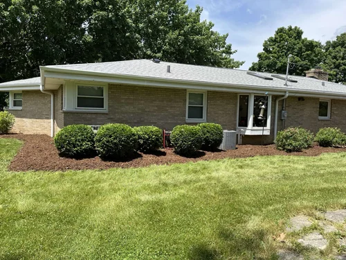 Low-maintenance shrubs in a Wisconsin landscape bed